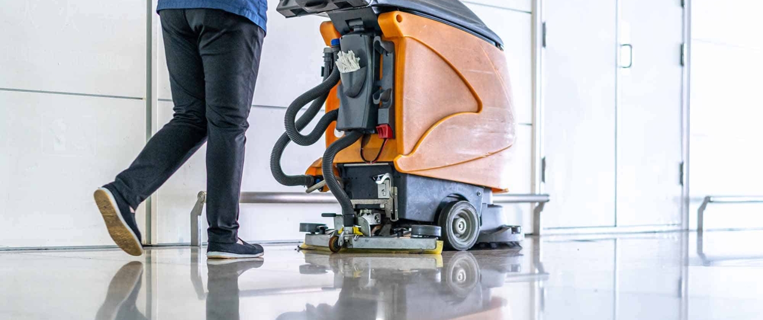 cleaning floor with machine