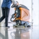 cleaning floor with machine