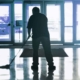 specialize services man mopping building lobby