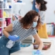 Workers cleaning retail counter