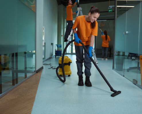 Workers Cleaning Office Space
