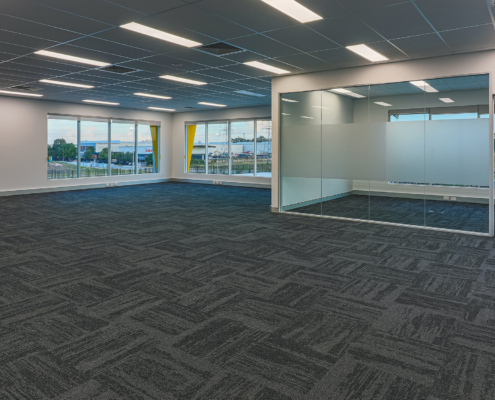 Empty Commercial Office Interior With Open Workspace
